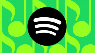 Spotify logo on green musical note background.
