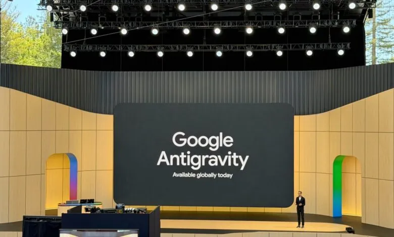 Google Antigravity announcement on stage with speaker and audience.