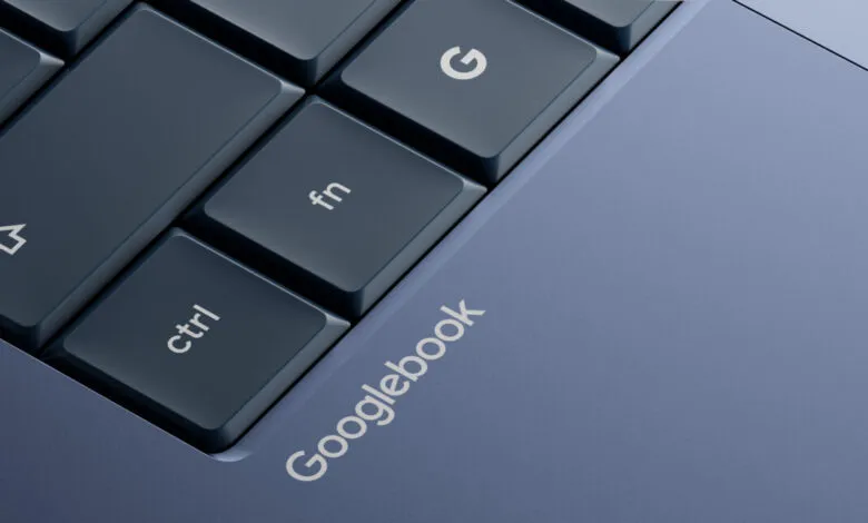 Close-up of a blue Googlebook laptop keyboard and chassis.