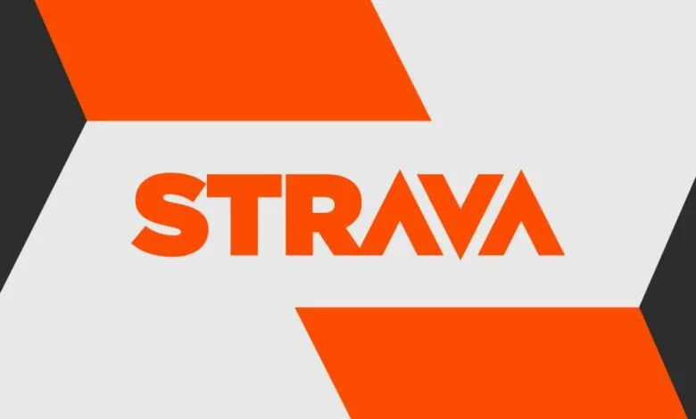 Strava logo in orange against gray and white background.