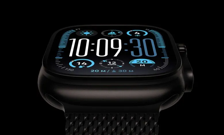 Close-up of Apple Watch Ultra 2 displaying a dark modular watch face with bright blue and white complications.
