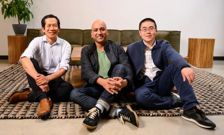Together AI founders Percy Liang, Vipul Ved Prakash, and Ce Zhang sitting together on a patterned rug.