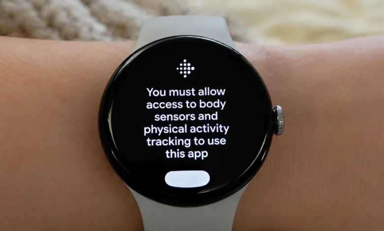 Google Pixel Watch displaying a body sensor permission error message on a wrist