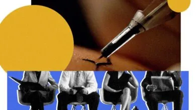 Close-up of a tattoo needle working on skin above four professionals waiting in chairs.