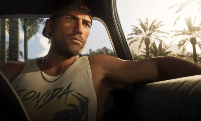 Jason Duval driving a car in a sunny tropical setting with palm trees outside the window.