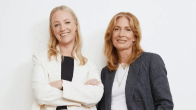 Margaret Coblentz and Dawn Dobras posing together against a plain white background.