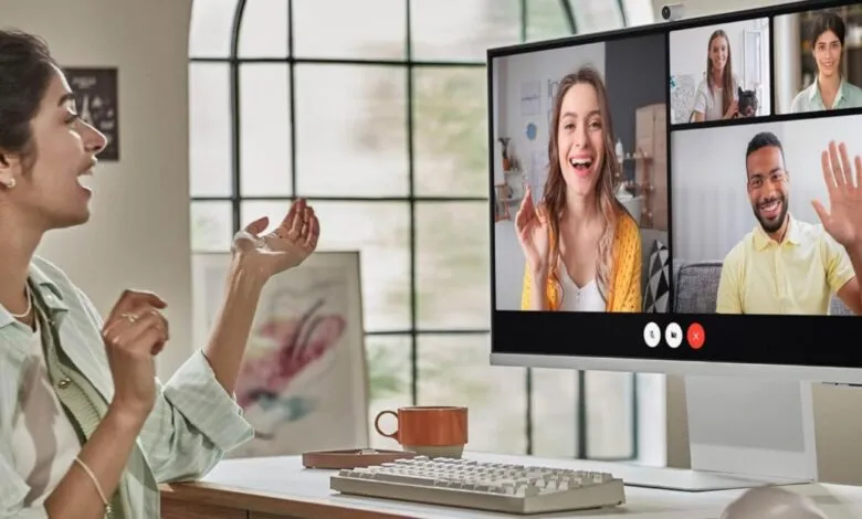 Woman smiling and gesturing during a video call on a Samsung M8 Smart Monitor
