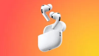 White AirPods Pro earbuds floating above their open charging case against an orange background.