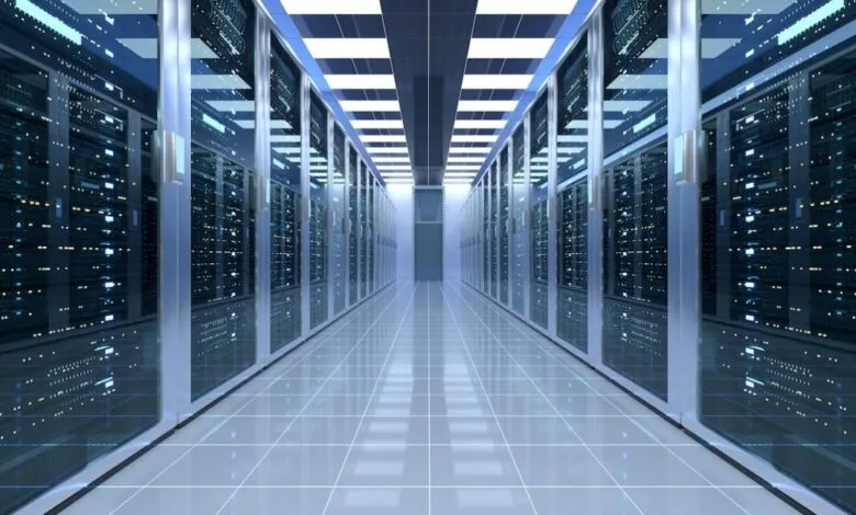 Symmetrical wide shot of a futuristic data center corridor lined with rows of blinking glass server racks.