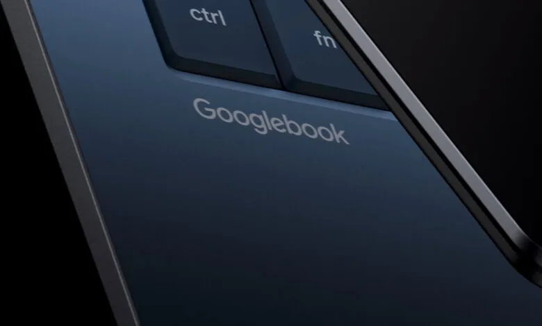 Close-up view of a blue Googlebook laptop showcasing the keyboard and silver logo branding.