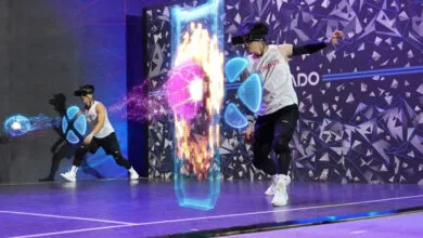 Two competitors play a futuristic AR techno sport wearing headsets, summoning digital shields and energy balls.