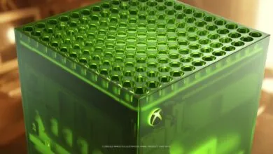 Close-up of a translucent green Xbox Series X console featuring its signature vented top grid.