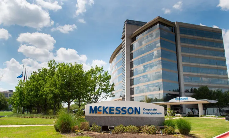 McKesson Corporate Headquarters building featuring large glass windows under a blue sky.