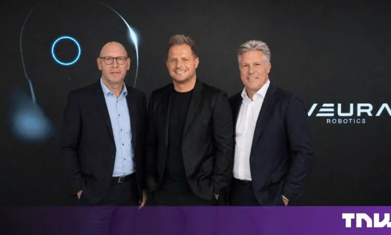 Three Neura Robotics executives posing against a dark branded backdrop
