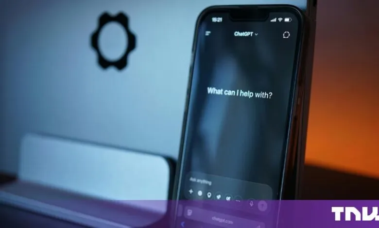 Smartphone displaying the ChatGPT app interface with the prompt What can I help with