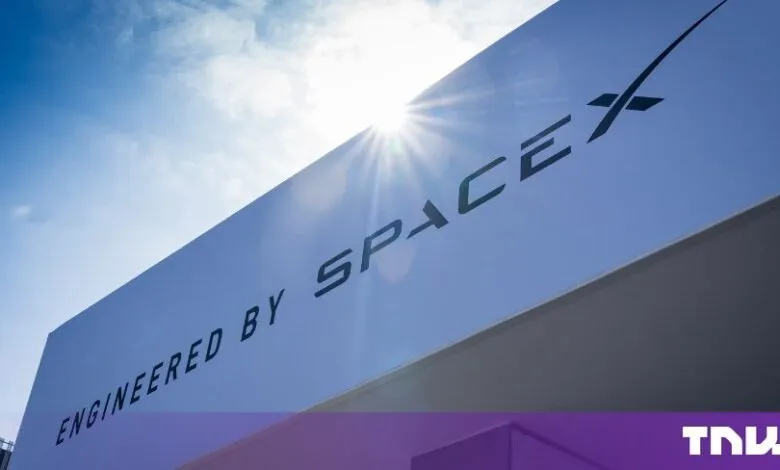 Engineered by SpaceX sign under a bright sun and blue sky.