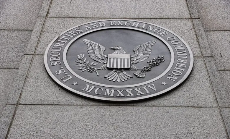 Circular bronze seal of the U.S. Securities and Exchange Commission mounted on a stone wall.