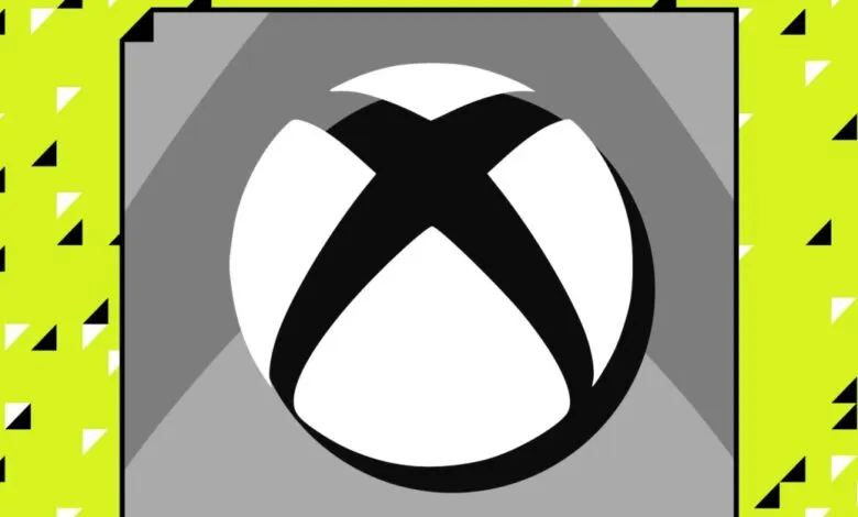 Xbox logo centered on grey notepad against a bright yellow patterned background