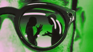 Two people arguing reflected in the lens of smart glasses equipped with a camera.