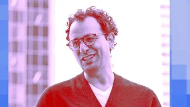 Portrait of OpenAI researcher and co-founder Wojciech Zaremba with a duotone pink and blue filter.