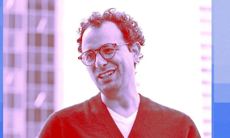 Portrait of OpenAI researcher and co-founder Wojciech Zaremba with a duotone pink and blue filter.