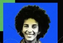 Portrait of AI researcher Timnit Gebru against a vibrant blue and black background.