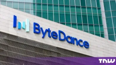 The blue ByteDance logo mounted on the stone exterior of a modern corporate skyscraper.