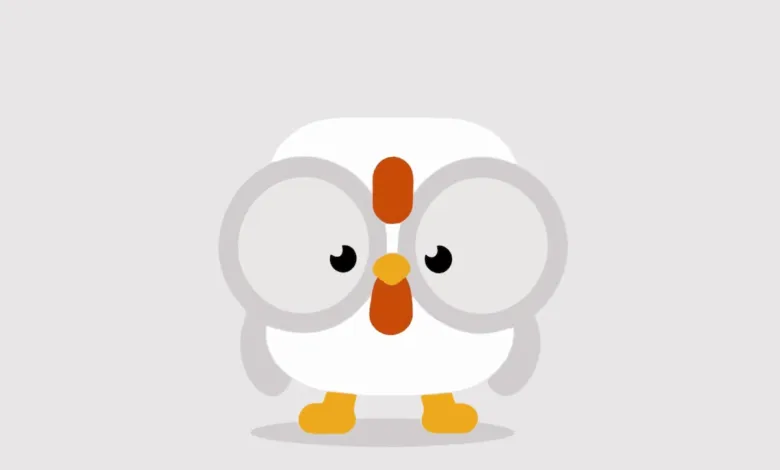 Minimalist digital illustration of a cute, square white chicken with large round glasses and orange accents