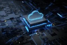 Glowing blue cloud icon hovering above a microchip on a complex dark circuit board background.