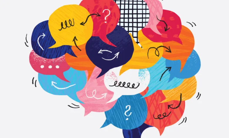 Colorful speech bubbles arranged in the shape of a human brain with arrows and doodles