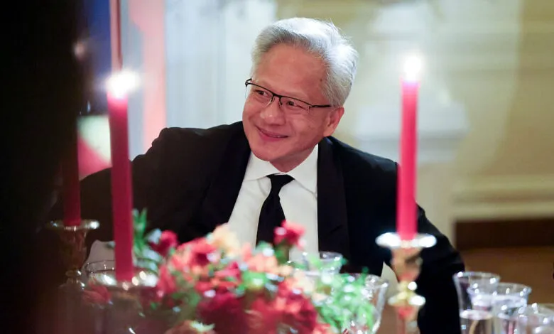 NVIDIA CEO Jensen Huang smiling at a formal white house state dinner