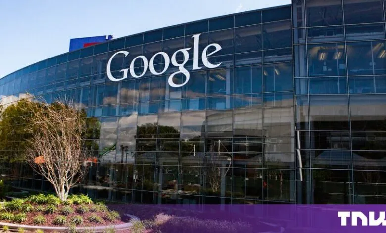 Exterior view of a modern Google office building with large glass windows and the company logo.