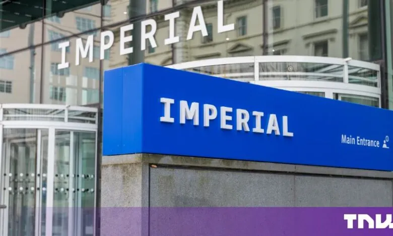 Blue and white sign reading IMPERIAL outside the main entrance of Imperial College London.