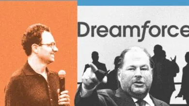 Tech leaders Marc Benioff and Dario Amodei speaking at a conference about AI at Dreamforce.