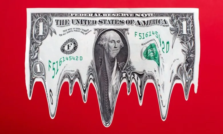 A one dollar bill featuring George Washington melts downward against a vibrant red background.