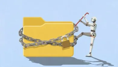 A robot uses a red crowbar to break a chain wrapped around a large yellow folder.