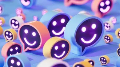 3D chat bubbles with glowing purple smiley faces on a blue surface