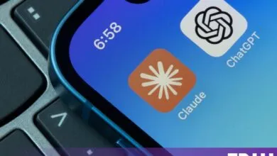 Claude and ChatGPT app icons displayed on an iPhone home screen next to a keyboard