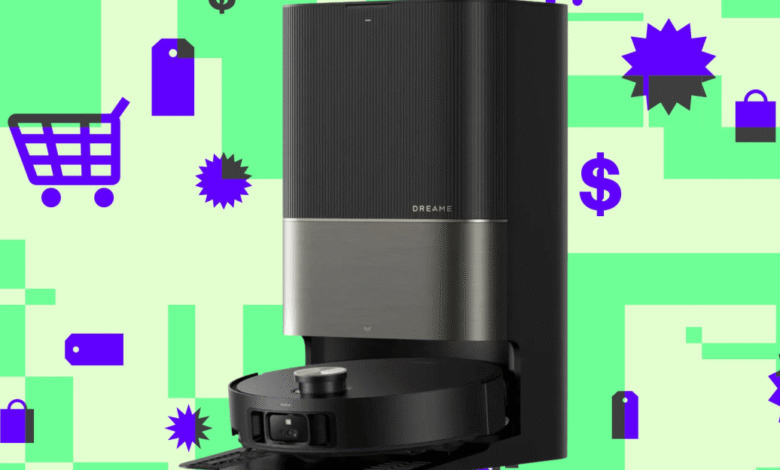 Dreame X50 Ultra robot vacuum docked in its black and silver station on green background