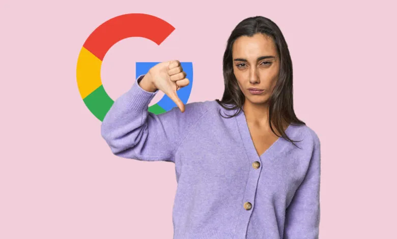 A woman in a purple cardigan giving a thumbs down in front of a Google logo.