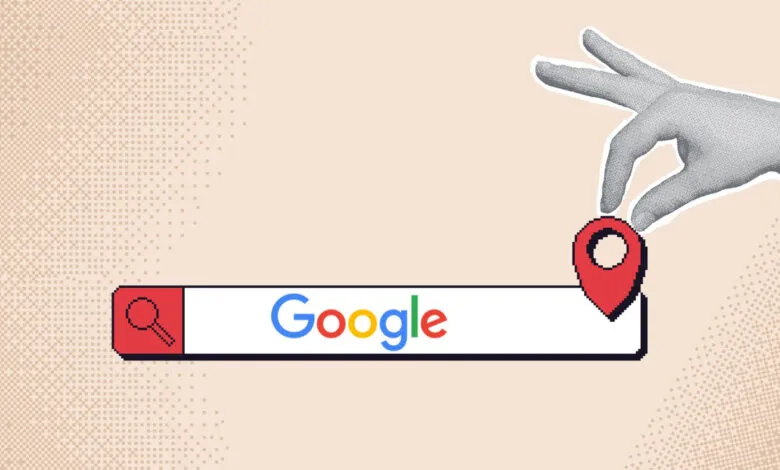 A stylized hand places a red map pin onto a pixelated Google search bar against a beige background.