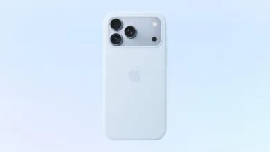 Back of light blue iPhone case featuring a triple-lens camera module and Apple logo.