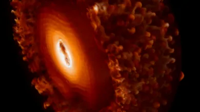 Swirling orange and white liquid abstractly resembles a glowing celestial sphere or cosmic nebula.