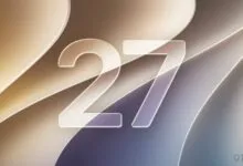 The number 27 in frosted glass over an abstract beige and purple background.