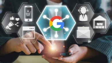 Person interacting with glowing digital interface featuring the Google logo and technology icons