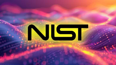 NIST logo set against a vibrant, glowing abstract background of pink, purple, and gold waves.