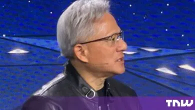 Nvidia CEO Jensen Huang speaking on stage in profile view