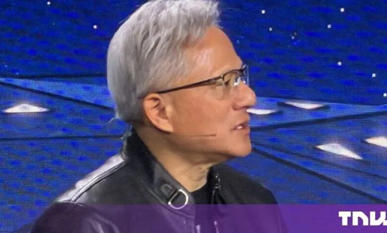Nvidia CEO Jensen Huang speaking on stage in profile view