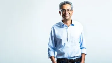 Portrait of investor and business leader Rajan Anandan smiling against a white background