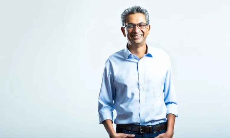Portrait of investor and business leader Rajan Anandan smiling against a white background